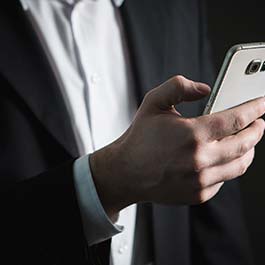 man contacting travel agency